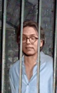 Keith Reniere behind bars